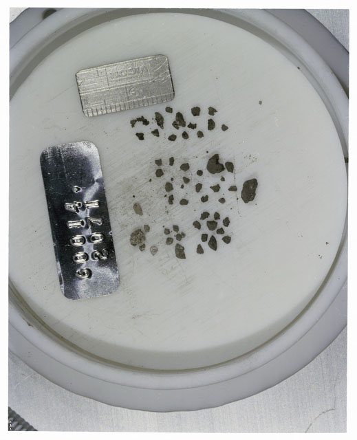 Color photograph of Apollo 16 Core Sample 60014,2071; Processing photograph displaying >1 MM Core Fines .
