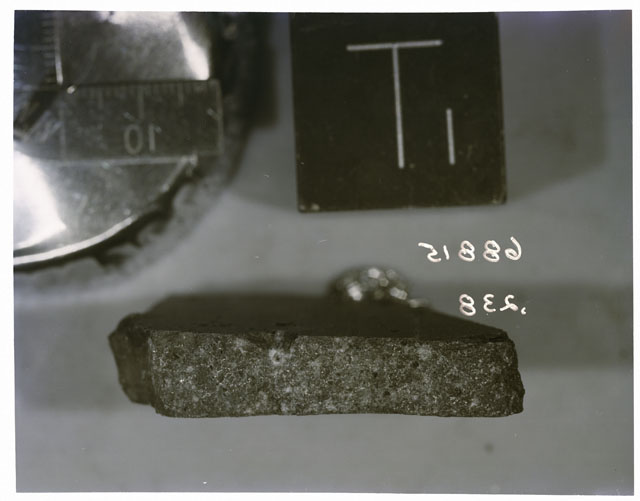 Color photograph of Apollo 16 Sample(s) 68815 ,238; Processing photograph displaying  with an sawed slab of T.
