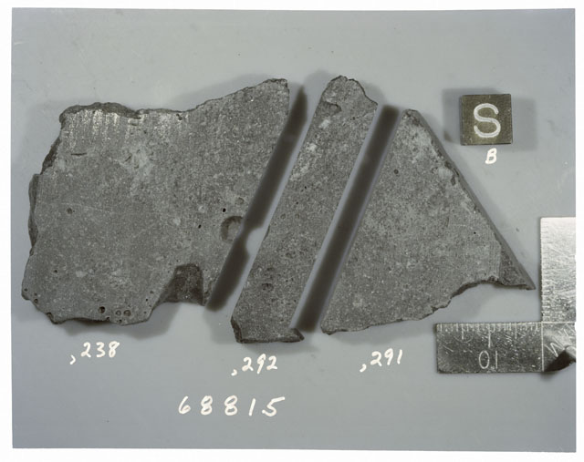 Color photograph of Apollo 16 Sample(s) 68815,238,292,291; Processing photograph displaying reconstruction with an sawed slab of S.