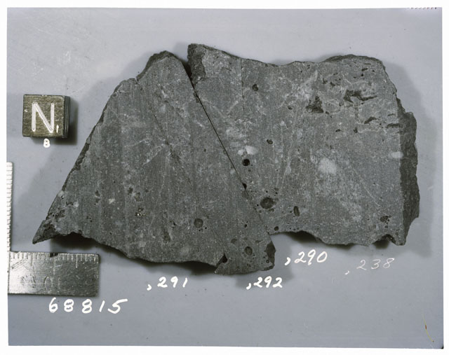 Color photograph of Apollo 16 Sample(s) 68815,290,291,292; Processing photograph displaying reconstruction with an sawed slab of N,B.