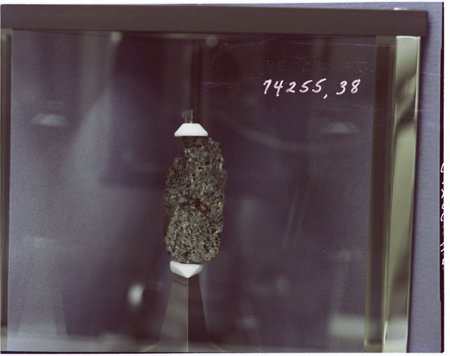 Color Processing photograph of Apollo 17 Sample(s) 74255,38 in a display case.