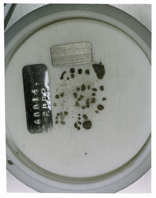 Color photograph of Apollo 16 Core Sample 60014,2089; Processing photograph displaying >1 MM Core Fines .