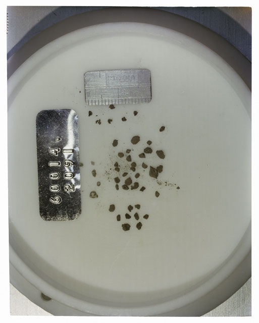 Color photograph of Apollo 16 Core Sample 60014,2091; Processing photograph displaying >1 MM Core Fines .