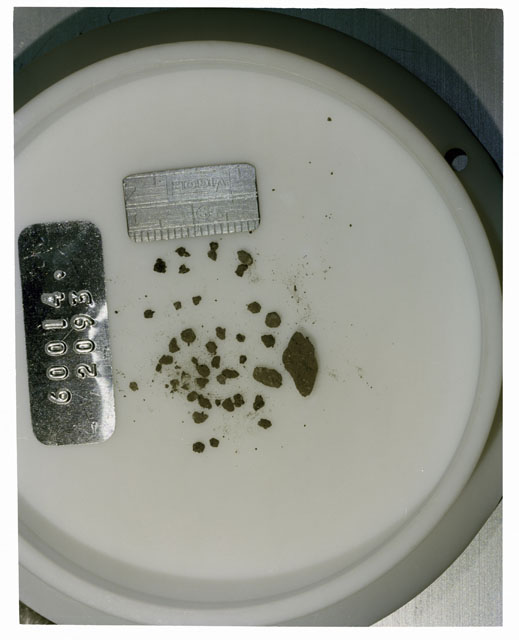 Color photograph of Apollo 16 Core Sample 60014,2093; Processing photograph displaying >1 MM Core Fines .