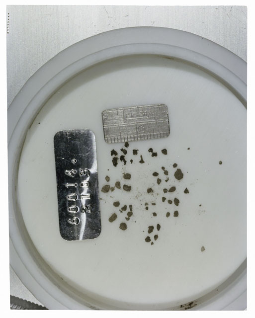 Color photograph of Apollo 16 Core Sample 60014,2103; Processing photograph displaying >1 MM Core Fines .