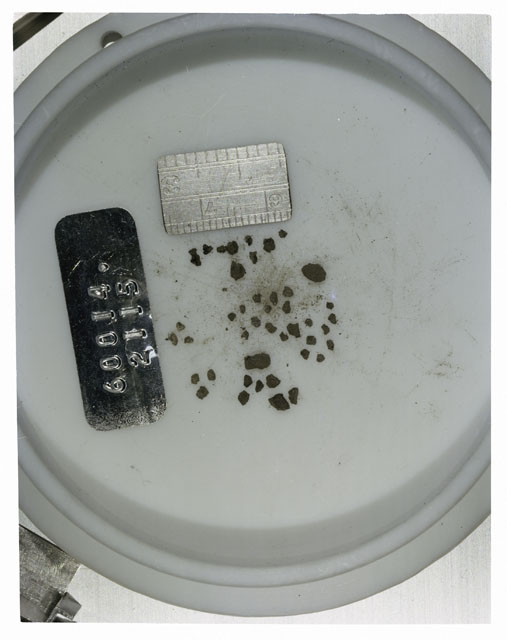 Color photograph of Apollo 16 Core Sample 60014,2115; Processing photograph displaying >1 MM Core Fines .