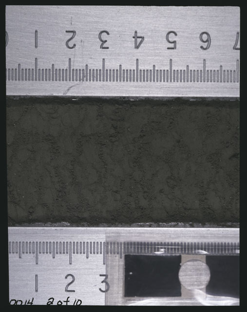 Color photograph of Apollo 16 Sample(s) 60014,0; 2 of 10 Processing photograph displaying after 3rd dissection Core Tube at 0-7 cm depth.