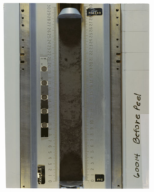 Color photograph of Apollo 16 Core Sample 60014,0; Processing photograph displaying an overview of the Core before peel.