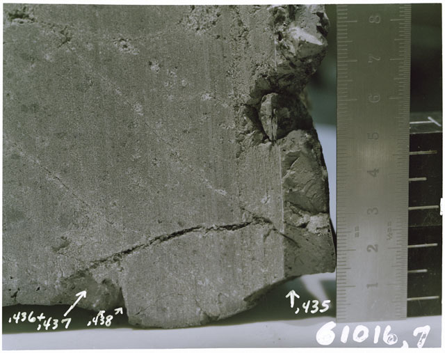 Color photograph of Apollo 16 Sample(s) 61016,7,435-,438; Processing photograph displaying sawed surface reconstruction.