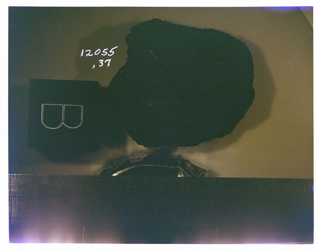 Color photograph of Apollo 12 Sample(S) 12055,37; Processing photograph displaying an orientation of B.