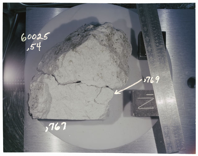 Color photograph of Apollo 16 Sample(s) 60025,54,767,769; Processing photograph displaying reconstruction with an orientation of N1.