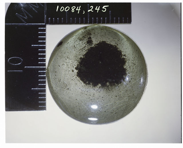 Color photograph of Apollo 11 Sample(s) 10084,245; Processing photograph displaying soil .