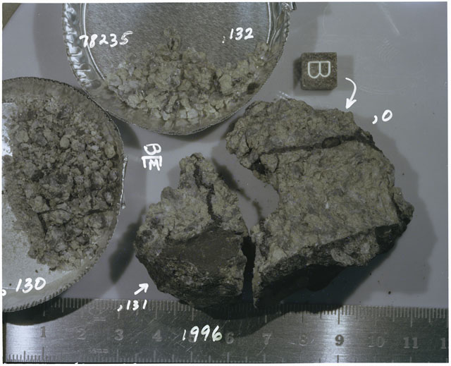 Color photograph of Apollo 17 Sample(s) 78235,0,130-132; Processing photograph displaying reconstruction with fragments and fines with an orientation of B.