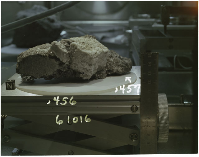 Color photograph of Apollo 16 Sample(s) 61016,456,457; Processing photograph displaying reconstruction with an orientation of T,E.