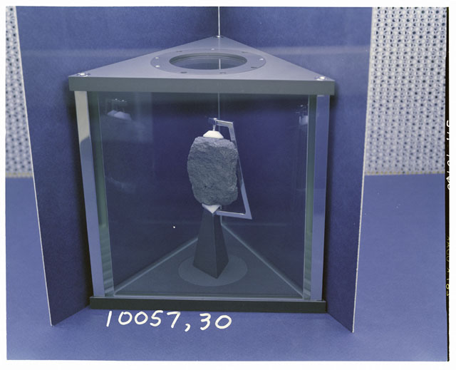 Processing photograph of Apollo 11 Sample(s) 10057,30 showing sample on display case.