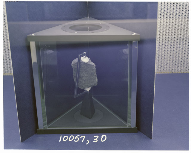 Processing photograph of Apollo 11 Sample(s) 10057,30 showing sample on display case.
